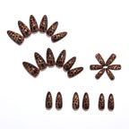 Amber leopard print nails