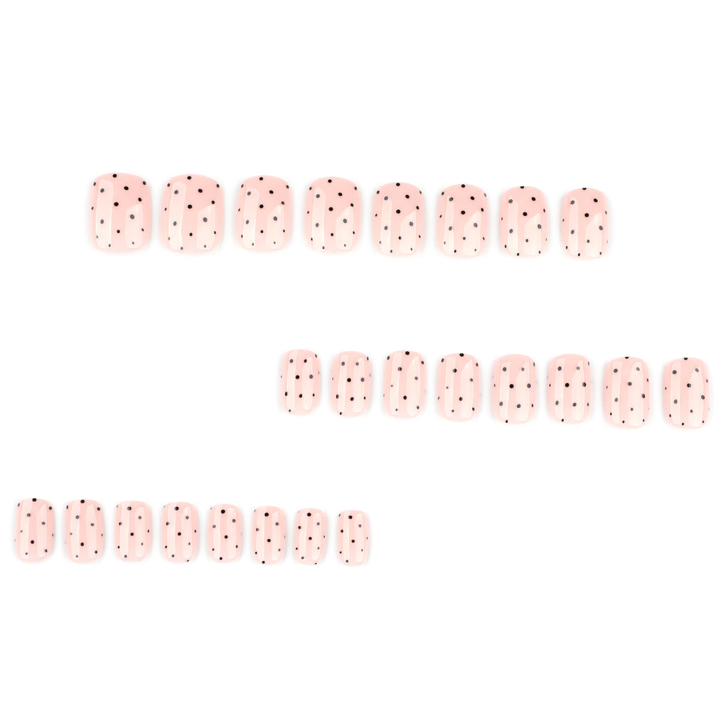 Black polka dot nails