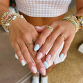 Light blue polka dot nails