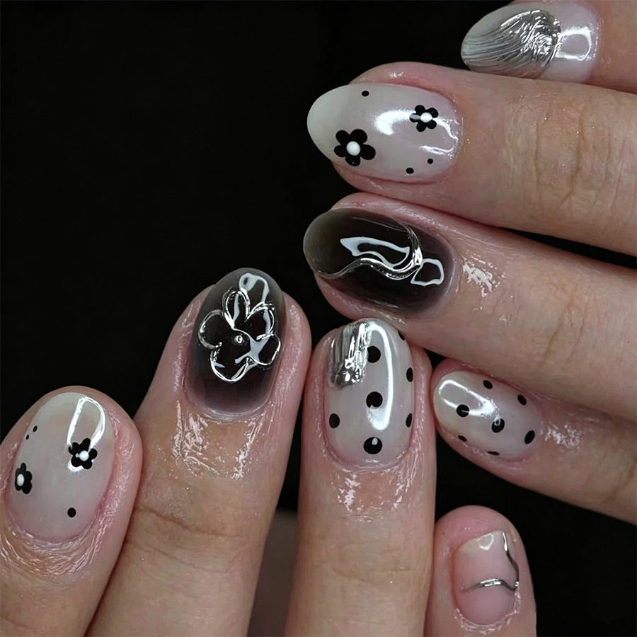 Silver polka dot nails