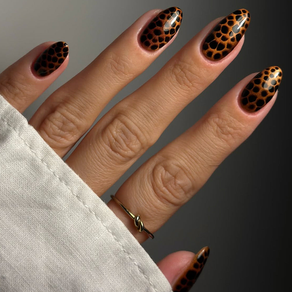 Amber leopard print nails