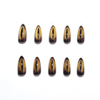 Yellow-eyed cat's eye nails