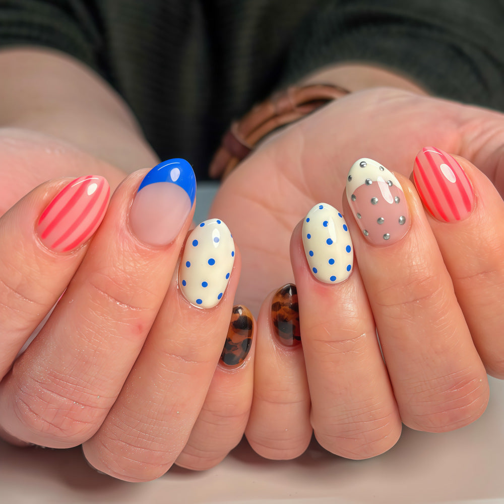 Red and blue dotted nails