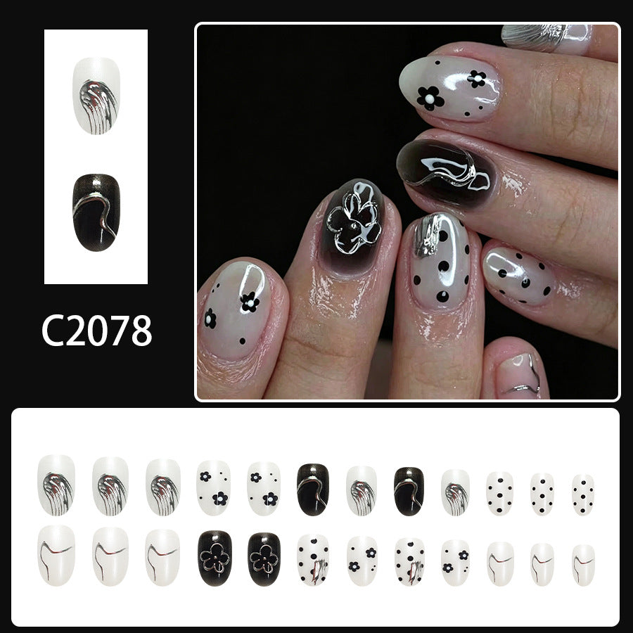Silver polka dot nails
