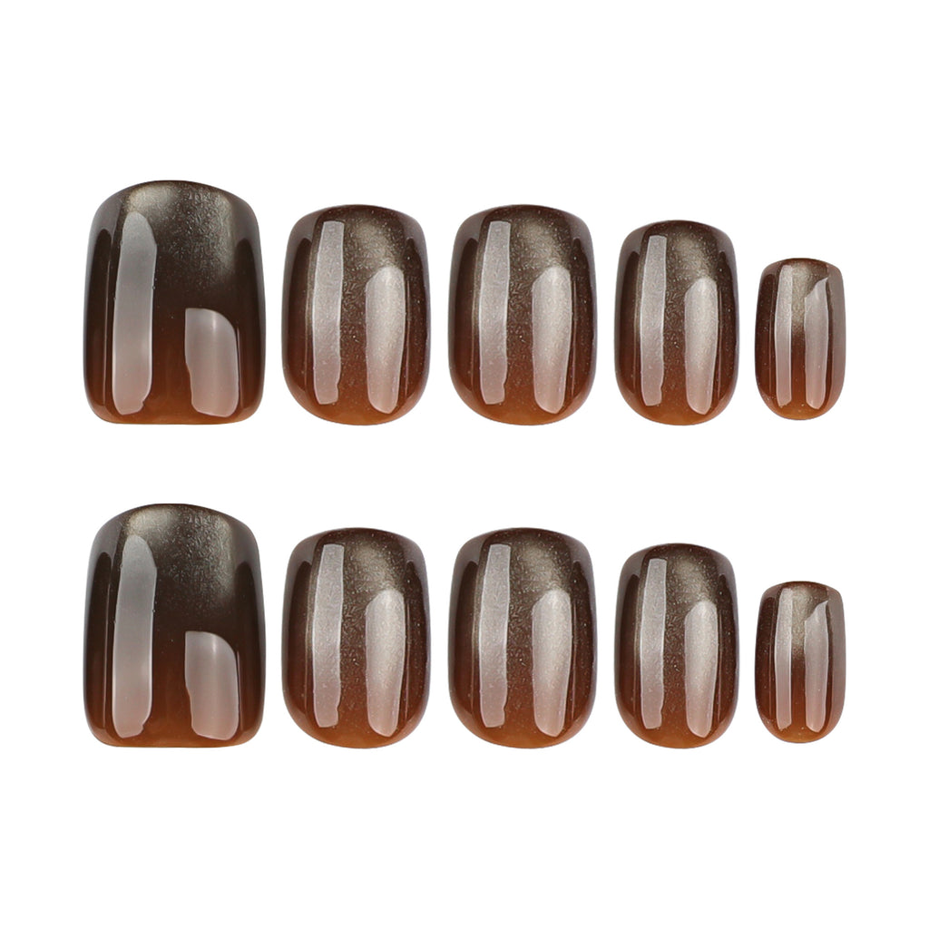 Dark brown cat's eye nails
