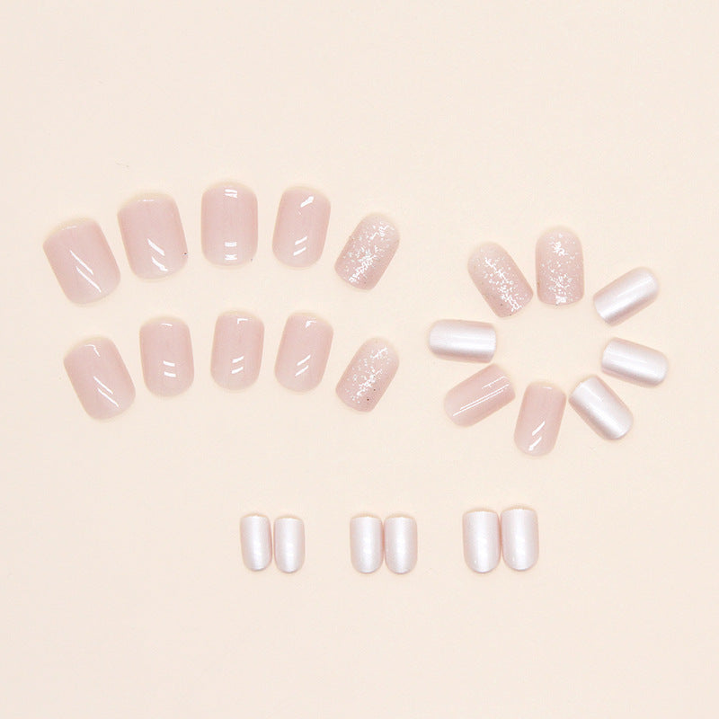 Shiny pearlescent pink nails
