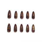 Amber leopard print nails