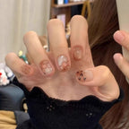 Leopard-patterned cat-eye nails