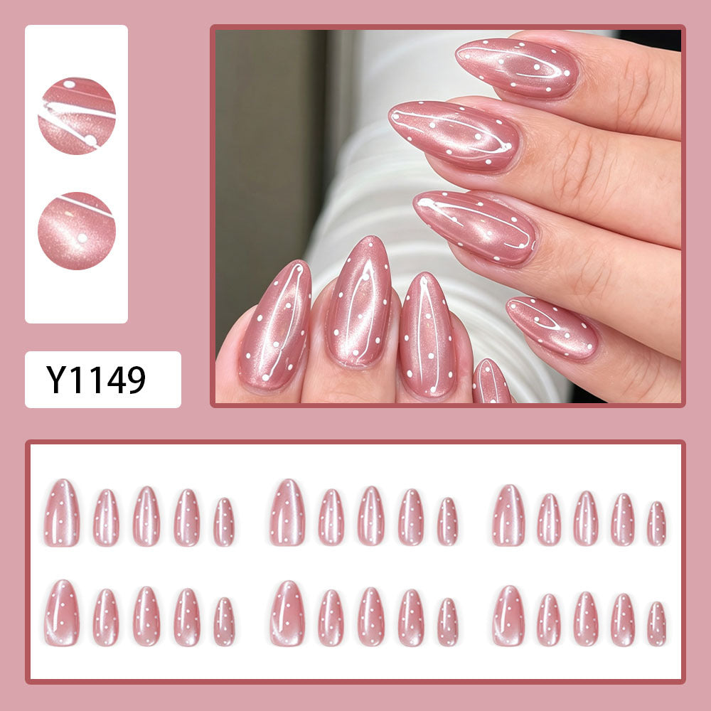 Peach polka dot nails