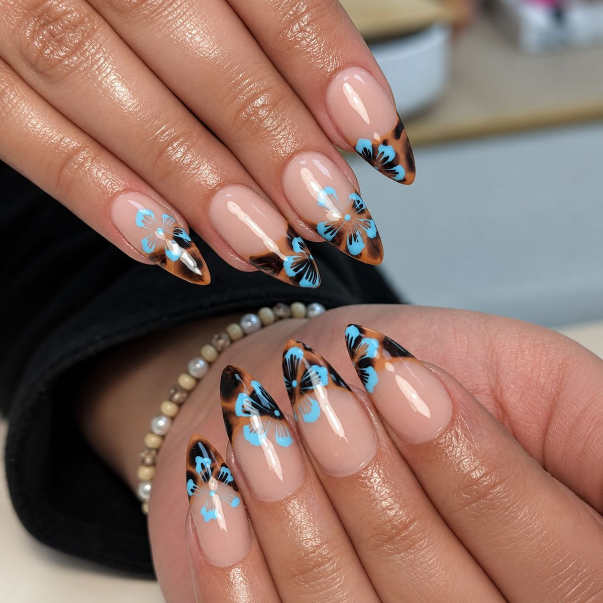 Blue-brown leopard print nails