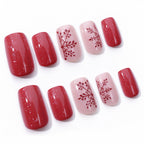 Wine-red snowflake nails