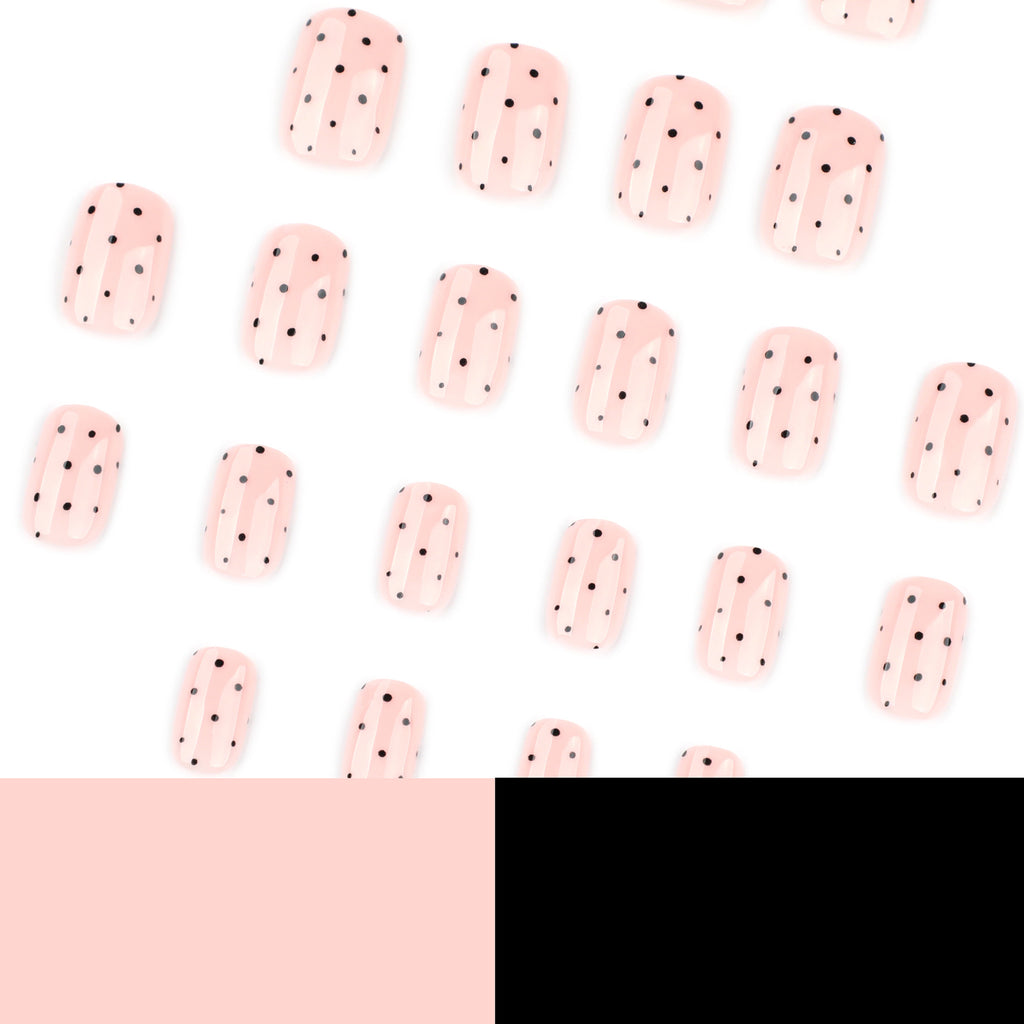 Black polka dot nails