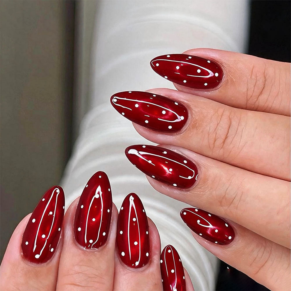 Wine-red polka dot nails