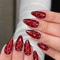 Wine-red polka dot nails