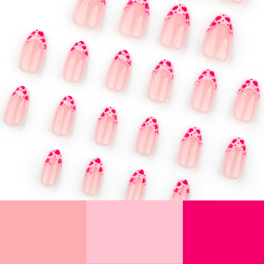 Raspberry heart-shaped nails