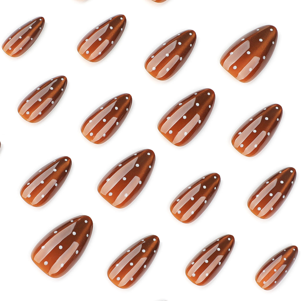 Polka dot cat's eye nails