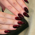 Red wine-colored cat-eye nails