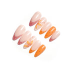 Orange polka dot nails