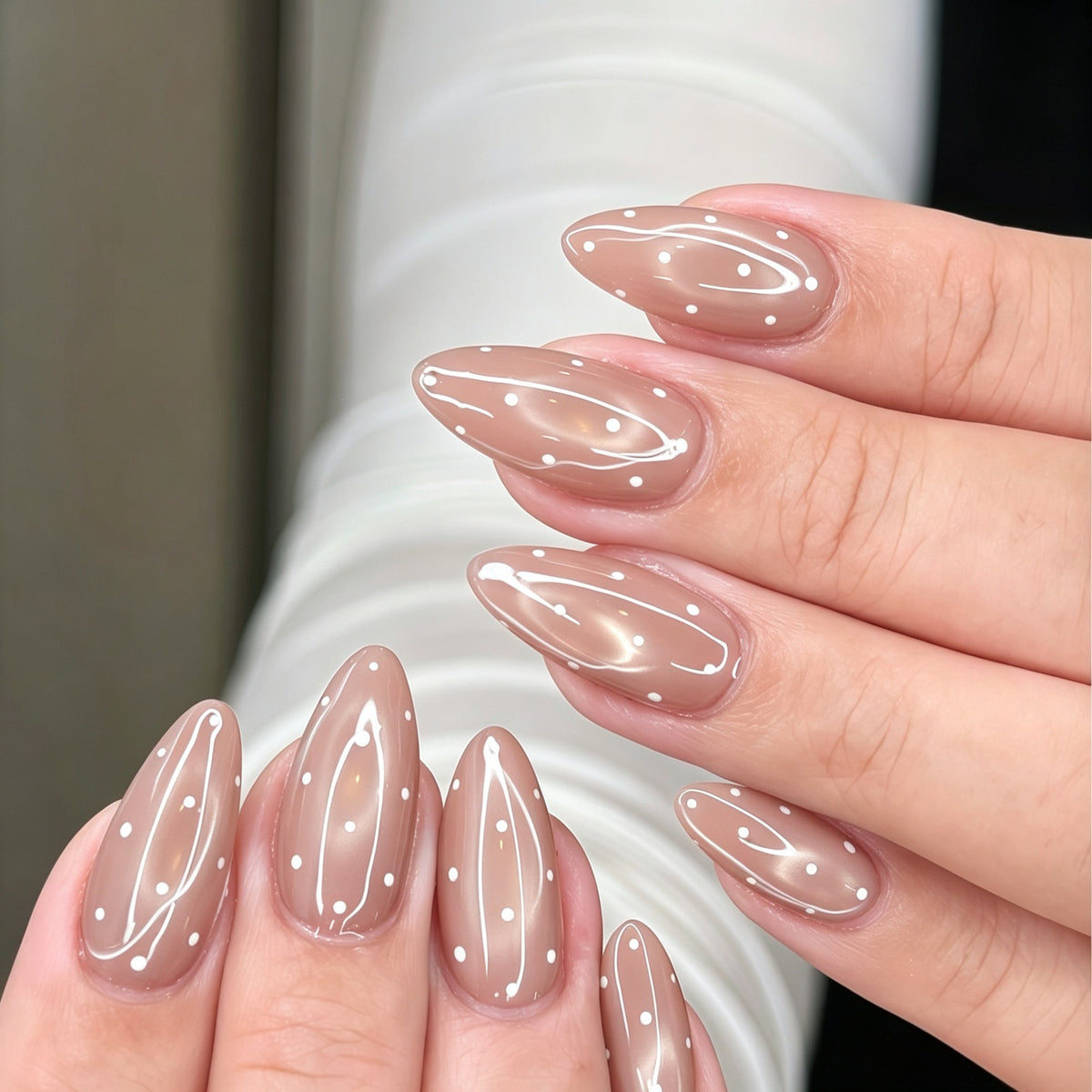 Nude polka dot nails