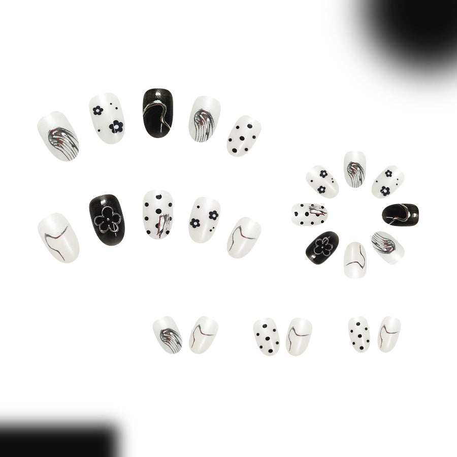 Silver polka dot nails