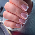Short square white French-style nails