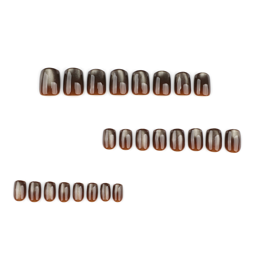 Dark brown cat's eye nails